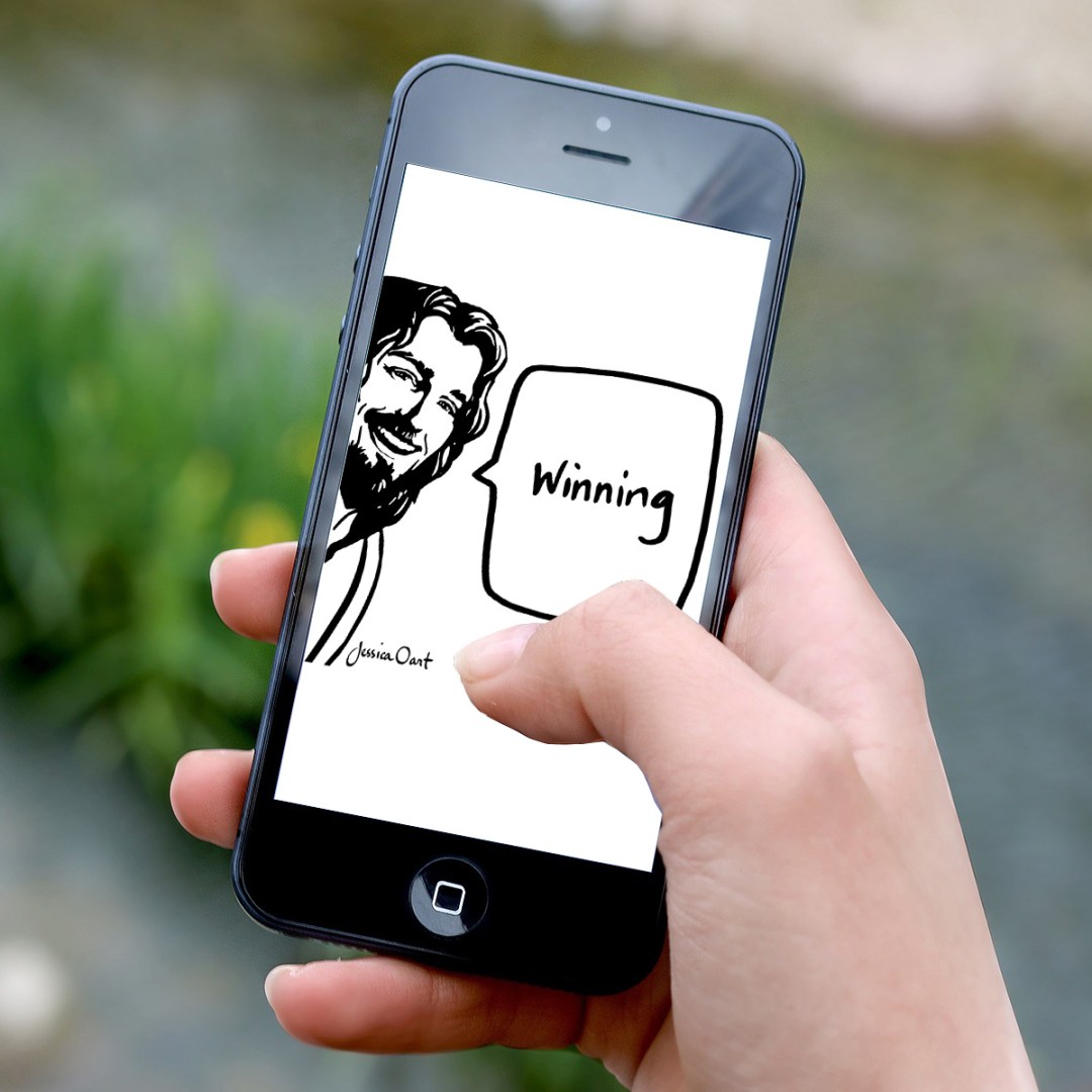 Phone Screen with Cartoon of Jesus that Says "Winning"